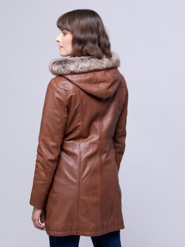 Ravensworth Long Leather Coat in Tan Make no mistake. The cold is coming. And there is no better protection against the elements than the Ravensworth long leather coat in a striking tan colourway. Not only designed to keep the cold at bay, we've crafted a flattering coat, with a long contoured panels to accentuate your figure.
Well-judged details include a detachable faux-fur trimmed hood, popper placket concealing a zip fastening, longline design, and a funnel collar. Stay warm this season and beyond.
We almost forgot to mention the sumptuously soft UK sourced aniline leather, with antique effect over-dye. It's easy to see why the Ravensworth is our new any-occasion hero.
Sizing
These measurements are based on a size 12 and will vary slightly between sizes.
Approximate centre back length: 84cm
Approximate sleeve length from shoulder to cuff: 63 cm
Approximate sleeve length from underarm to cuff: 44cm
The Details
Exclusive to Lakeland
Style Name: Ravensworth Long Leather Coat
Colour: Tan
Material: Aniline Leather
Fit: Easy Fit
Two zip pockets
Concealed zip front fastening
Faux fur trim
Removable hood
Funnel collar with toggle detail
And on the inside
Tonal satin lining