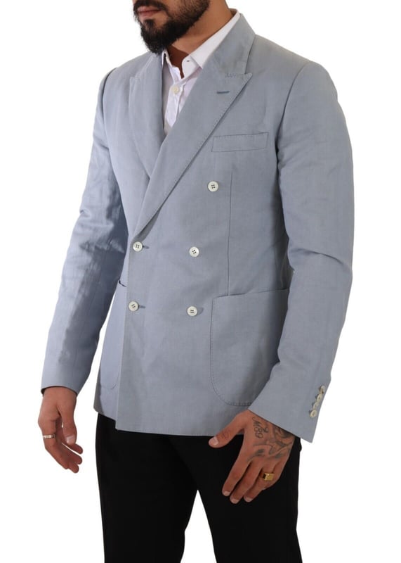 Brand: Dolce & Gabbana
  Style: Double breasted
  Fitting: Slim fit
  Colour: Light Blue
  Made in Italy
  Material: 60% Cotton 40% Flax
  Lining: 100% Viscose
  Logo details
  Very exclusive and high craftsmanship
Material: 60% Cotton 40% Flax
