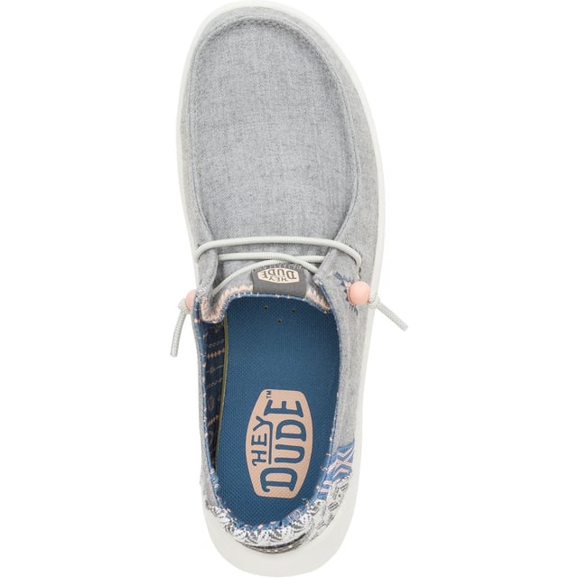 Up your style game with Wendy Peak Chambray Woven. Added, cushy comfort and height meets woven textile heel and webbing details for the perfect mix of comfort and style. So easy to put on you'll never wanna take 'em off.