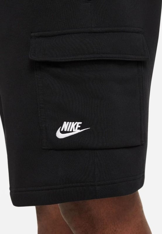 Nike Club Mens Cargo Shorts in Black The Nike Sportswear Club Fleece Shorts are made with a soft, brushed-back fleece that provides a comfortable feel ready for everyday wear . - - . Elastic waistband with an adjustable drawcord lets you personalize the fit . - - . A flap pocket on the left leg provides additional storage for your phone and other small essentials . - - . Brushed-back fleece fabric feels soft and smooth . - - . Standard fit for a relaxed, easy feel.