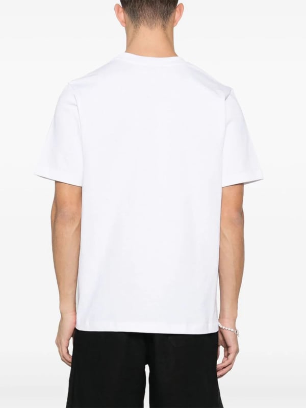 Casablanca's graphics often depict a fantastical world of sporty utopian scenes – the illustrative print on this organic cotton T-shirt portrays a Mexican-inspired landscape with a tennis court in the middle.