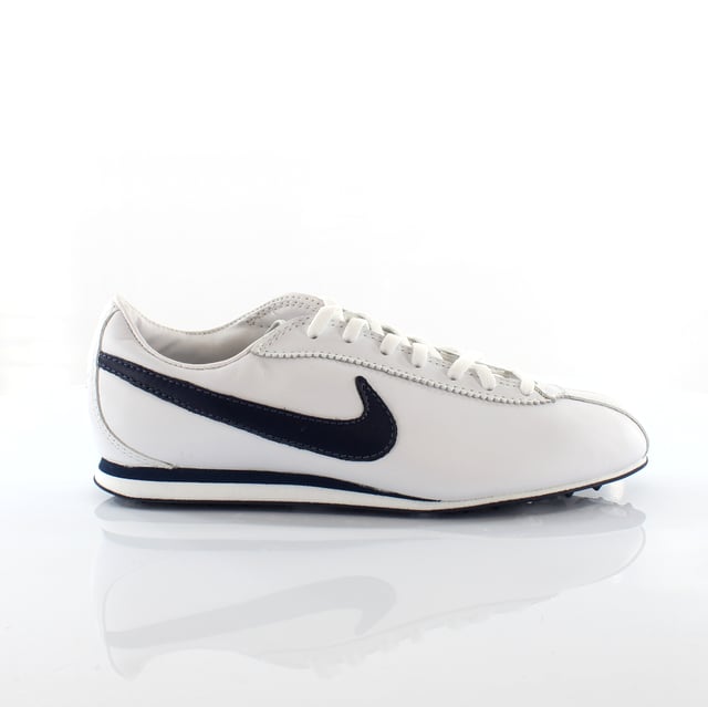 Nike white leather trainers womens hotsell