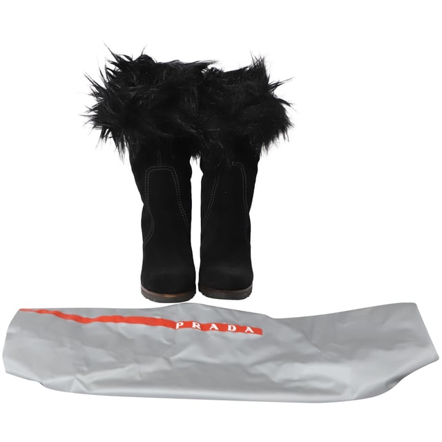 Prada Faux Fur Ankle Boots in Black Suede VINTAGE, RRP AS NEW
Fashionable and chic, these ankle boots from Prada will cut an alluring silhouette from day to night. Crafted from suede, the ankle boots have faux fur trims and block heels. They are complete with comfortable insoles.
Prada Faux Fur Ankle Boots in Black Suede
Sign of wear: minimal scuffmarks and dirt stains on heels and outsoles, gentle scrape on heel counter seams
Condition: very good, comes with dust bag
Material: Suede
Color: Black
Size: 35.5/36.5/UK2.5/US5.5
SKU: 146715
