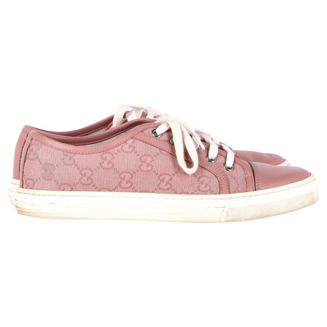 VINTAGE, RRP AS NEW
These Gucci sneakers are simple yet stylish. They've been crafted from soft pink GG canvas as well as leather and designed with simple lace-ups. Set on rubber soles, these sneakers are just perfect to ace one's casual style.


With box

Gucci GG Monogram Low Top Sneakers in Pink Leather
Condition: Very good
Signs of wear: Include Box., Minor markings, Lightly used but very well maintained. Minor mark at soles & creasing, light scuffing at the soles and heels.
Packaging: Box, Dust bag
Color: Pink | rose
Material: Leather 
Size: EU37
Measurements: Heel height: 25; Insole length: 270
SKU: TONPUGBSH370912W