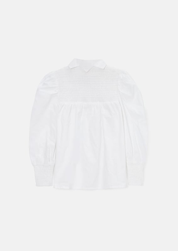 Dress like a superSTAR in our new shirt! Crafted from crisp   cotton with smocking detail and a flowing silhouette with the cutest star shaped collar. Wear with denim for the perfect transitional outfit.