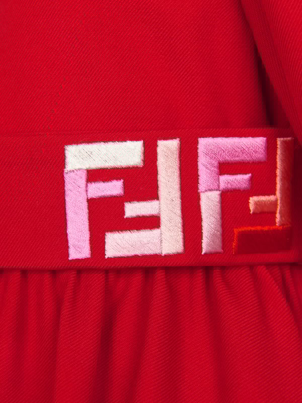 The perfect dress for your little lady designed by Fendi Kids. The rich red piece features a tiered skirt with an empire line colour-matched belt embroidered with the iconic FF monogram and gently puffed sleeves. Made from soft wool and fully lined, this beautiful dress offers style and comfort.