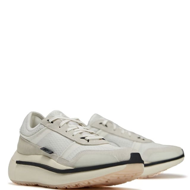 Mens Y-3 Ajatu Run Trainers in white.- Suede  double-layer textile and mesh upper.- Lace closure.- Lightstrike cushioning.- Collapsible feel.- Suede and mesh lining.- Rubber outsole.- Ref: GW8614