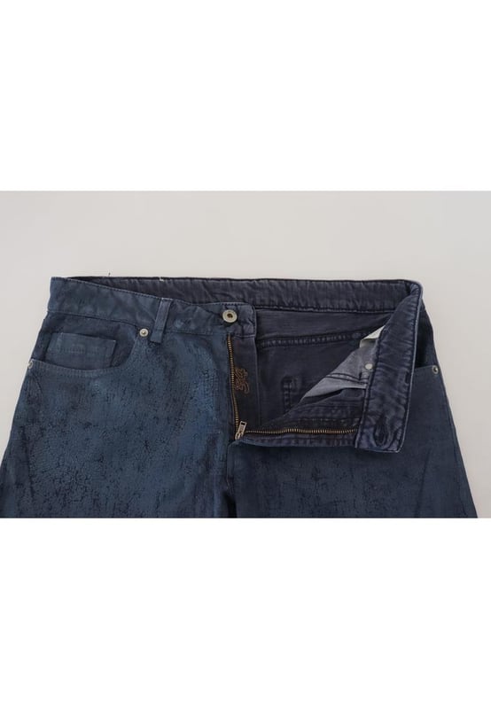 Marca: EXTE.
  Modelo: Tapered Denim.
  Color: Azul.
  Material: 98% algodon 2% elastano.
  Detalles del logotipo.
  Fabricado en Italia.