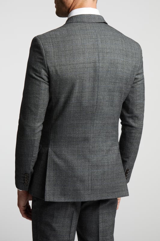 Slim Fit Pow Check Jacket Our Sagan suit jacket is here to make your formalwear look as sharp as ever. Crafted in luxurious wool blend with a charcoal blue pow check design, this double breasted slim fit jacket will make for a smart addition to your wardrobe. Complete with signature Ted Baker floral lining and a delicate leaf lapel pin, for guaranteed comfort and elegance.