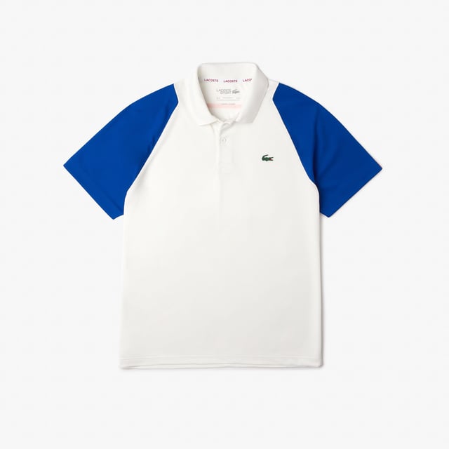Performance & Assets Technical capsule The technical capsule offers the complete seasonal wardrobe on and off court with a strong design identity thanks to its new tape and LACOSTE wording animation. Regular fit: natural ease on body Ergonomic cut and sewn for an athletic silhouette Technical piqué knit for a maximum of comfort & freshness during your matches under high temperatures Ultra dry property : moisture management performance you need to play at your best and stay dry. Eco responsible fabric : recycled polyester New green silicone crocodile New strong LACOSTE wording print at back