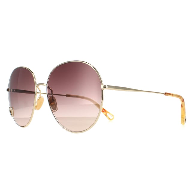 Las gafas de sol Chloe Round Womens Gold Brown Gradient Ch0027S son un bonito estilo redondo fabricado en metal ligero. Las plaquetas nasales de silicona garantizan comodidad durante todo el día, mientras que el logotipo de Chloe en el interior de las patillas -tips de autenticidad.
