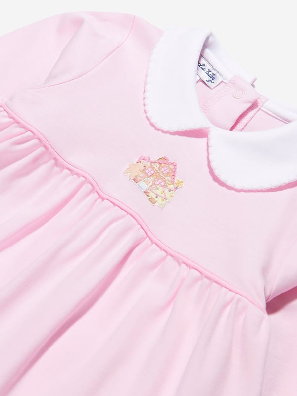 Grace your little one's wardrobe with the luxurious Baby Girls Sweet Gingerbread Collared Babygrow in Pink by Magnolia Baby, available in elegant white. This designer piece promises an elegant and comfortable fit for your baby girl, boasting the following features: Contemporary Print Designer: The fashionable gingerbread print enhances its visual appeal, transforming it into more than just a regular top. Unparalleled Comfort: Crafted from the softest high-end materials, it guarantees your baby's unparalleled comfort, making it ideal for her playful escapades. Wardrobe Upgrade: Uplift your baby girl's wardrobe today with the chic Baby Girls Sweet Gingerbread Collared Babygrow in Pink in White. Make her feel special and stand out with style - order now!