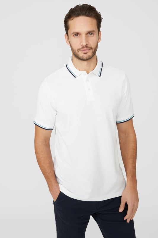 Introducing our Pique Tipped Polo, the perfect addition to any man's smart casual wardrobe. Crafted with meticulous attention to detail, this polo offers a sophisticated and polished look. The pique fabric provides a comfortable and breathable feel, making it ideal for all-day wear. With its stylish tipped collar and cuffs, this polo adds a touch of elegance to any outfit. Whether you're heading to the office or out for a casual gathering, our Pique Tipped Polo is the ultimate choice for a smart and effortlessly stylish look.