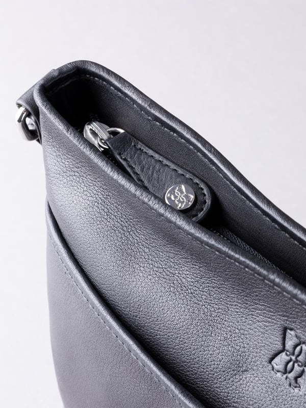 Perfect for carrying your everyday essentials, no matter the season, the Farlam Leather Cross Body Bag in black is a handbag necessity. Easy to co-ordinate with any outfit, it's equally practical and stylish. We've added to the classic silhouette with an intricate plait detail, and of course used the softest leather to create your new favourite handbag.