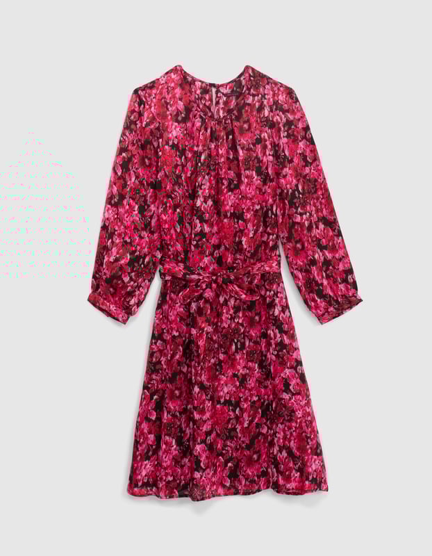 Pink flower print mini dress with removable belt. Opening in the back and button fastening on the back of the collar.