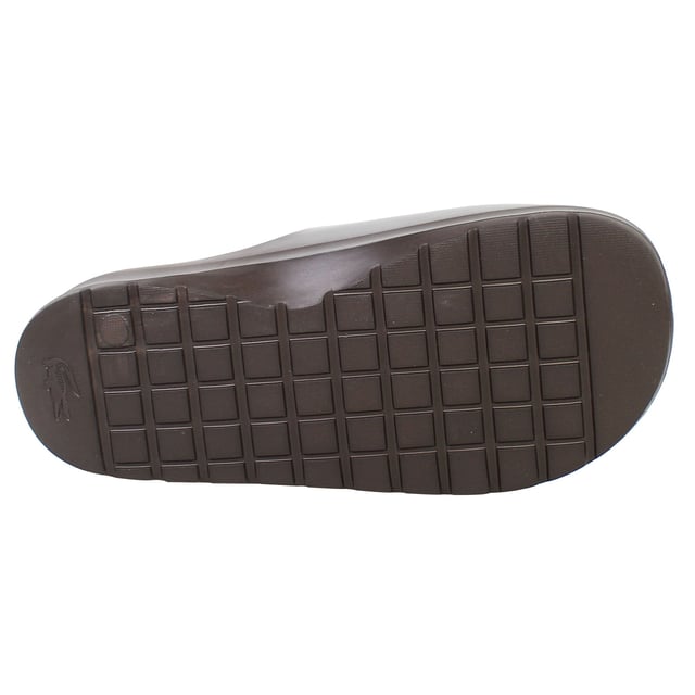 The Lacoste Serve Slide 2.0 223 2 CMA Men's BrownÂ Sliders deliver timeless style and exceptional comfort, making them a versatile option for casual wear, poolside lounging, or beach outings. These sliders feature a sleek design with iconic branding for a polished yet relaxed look.
Â 
Key Features:
Ergonomic Footbed: 

Contoured for superior comfort and support, ideal for extended wear.


Durable Synthetic Strap: 

Embossed with the signature Lacoste crocodile logo, adding a stylish and recognizable touch.


Slip-On Design: 

Easy to wear, offering convenience for relaxed occasions or quick outings.


Textured Rubber Outsole: 

Ensures reliable grip and traction on both wet and dry surfaces.


Lightweight Construction: 

Reduces fatigue, making them perfect for all-day comfort.


Water-Resistant Materials:

Designed to handle pool, beach, or shower environments without compromising durability.


Classic BrownÂ Colorway:Â 

A versatile and timeless design that pairs effortlessly with casual or sporty outfits.


Â 
The Lacoste Serve Slide 2.0 223 2 CMA Men's BrownÂ Sliders are a must-have for laid-back footwear, offering a combination of comfort, durability, and understated style for any relaxed occasion.
Â 
Â 
Â 