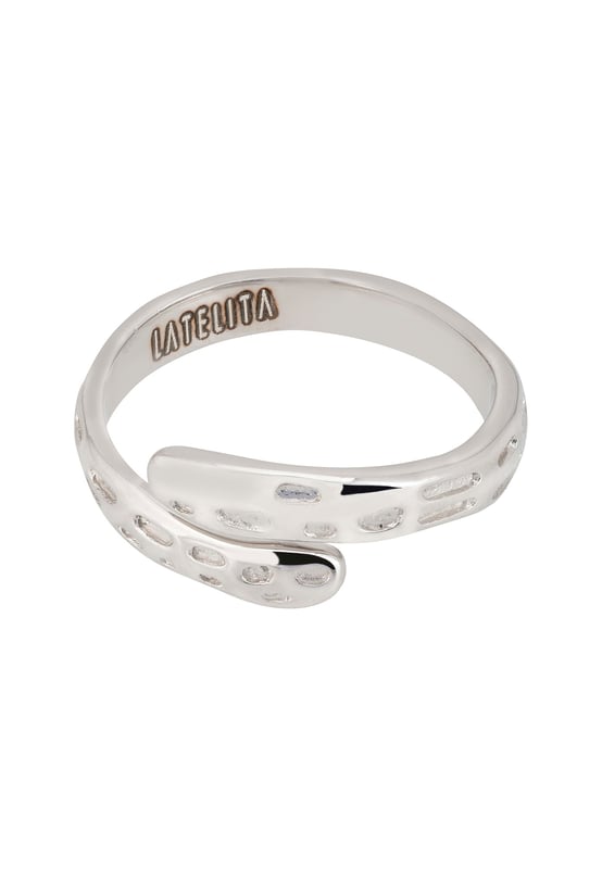 Embrace the whispers of the wild with our Nature's Embrace Band Ring in sterling silver. This ring, crafted from 925 sterling silver, takes inspiration from the rugged beauty of tree bark, achieved through a meticulous hammered texture. Weighing in at a mere 2.7 grams, this lightweight ring is as comfortable as it is stylish. Offered in four sizes, it's versatile enough to be worn solo for a subtle statement or as part of a bold midi-style stack. Transform your everyday look with this piece that beautifully blends modern design with nature's timeless patterns.
