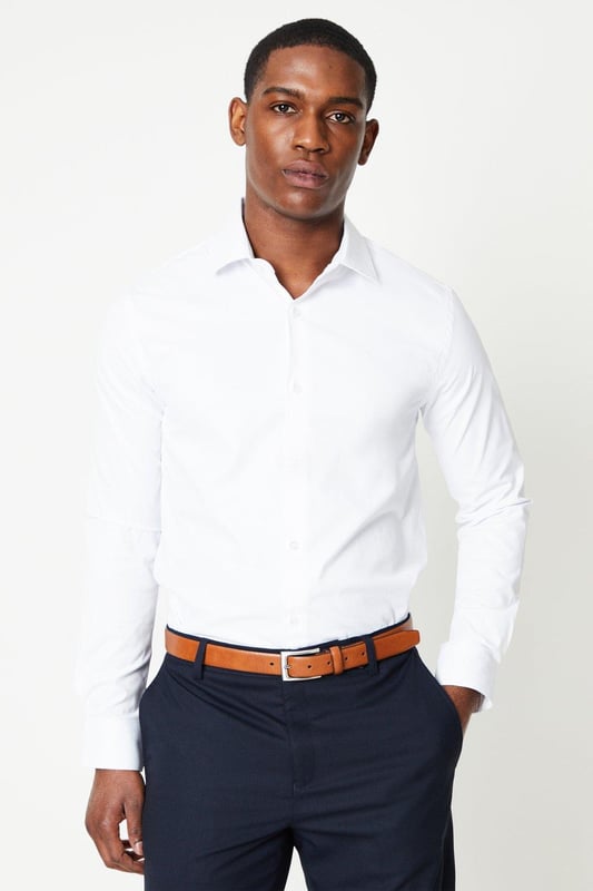 Skinny fit for a sleek, tailored silhouette
Long sleeves with a classic collar
Easy iron fabric for a crisp, wrinkle-free look
Button-down front for a timeless aesthetic
Versatile white hue to pair with any ensemble

Exude sophistication with this white skinny fit shirt from Burton. Crafted with an easy iron fabric, it ensures a polished appearance for smart casual events or formal occasions. The slim silhouette and long sleeves create a refined look, while the classic collar and button-down front add a touch of timeless elegance. Style it with tailored trousers and a blazer for a dapper ensemble, or pair it with chinos and brogues for a more relaxed yet refined aesthetic.