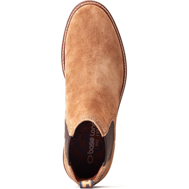 Base London Portland Leather Men's Ginger Boots The Portland Chelsea Boot by Base London is crafted with premium leather uppers, a robust nylon pull tab, and elasticated gusset for easy wear. The cushioned Ortholite insole ensures comfort, while the thick rubber studded sole adds a rugged touch.