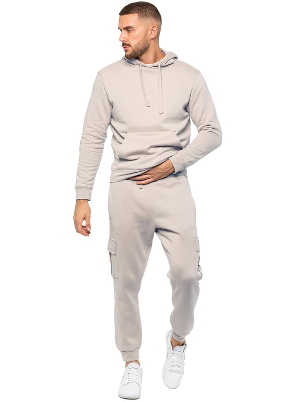 Enzo Mens Overhead Hoodie Tracksuit Set. Regular Fit, Long Sleeve Hoodie with Cuffed Wrists and Adjustable Drawstrings. Features EZ Logo On Chest And Joggers. Regular Fit Cargo Jogger. Elasticated Waistband With Adjustable Drawstring. Features 2 Side Slash Pockets, 2 Cargo Pockets, Single Welt Back Pocket. Ideal to use for Casual and Work wear.