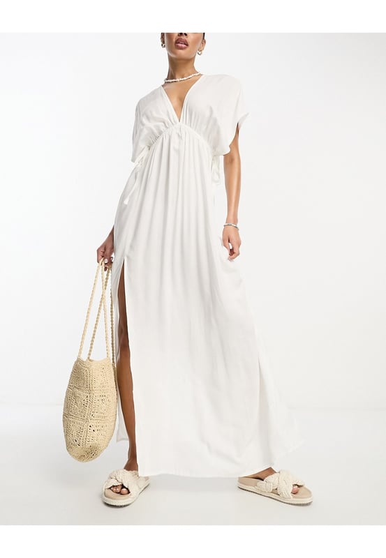 chinese dress ladies Rent Asos Petite Flutter Sleeve Embellished Wrap Maxi Dress With Embroidery  In Light Pink main image 0