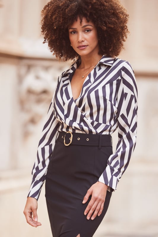 REASONS TO BUY:

Power dressing
2-in-1 style - we've done the hard work for you
That wrap top is so flattering
Crafted from the silkiest satin fabric
Waist-cinching, hip-hugging pencil skirt
Think courts or strappy heels