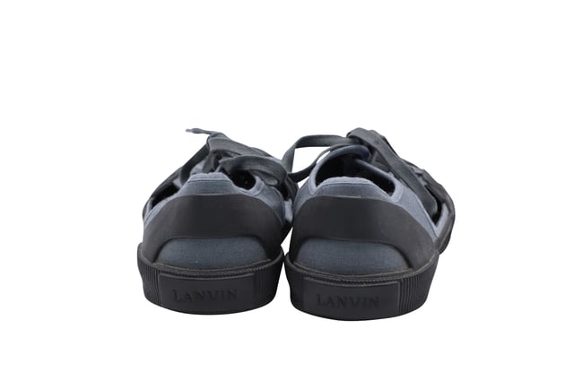 VINTAGE, RRP AS NEW
Lanvin takes innovation to the next level.  These sneakers made of canvas features an open side for a more breathability.  This elaborately constructed shoe stands for it's unique style.  Wear a funky pair of socks with this shoe to be fun and to have an eccentric style. 
Lanvin Open Low-top Sneakers in Grey Canvas
Condition: Very Good
Sign of wear: Wear on the soles
Material: Canvas/Rubber
Color: grey
Size: UK6/US7/40
SKU: 127105
