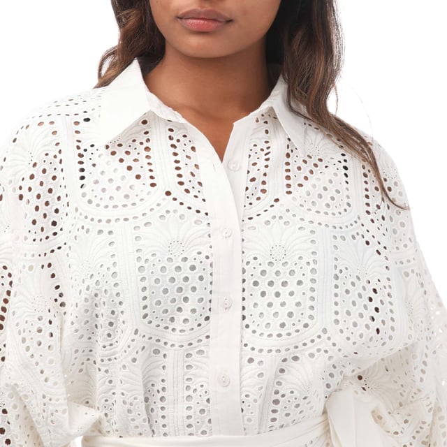 Women's Sundress Florine Short Dress in White.- Classic collar.- Flared sleeves.- Button fastening.- Shirt cuffs.- Pineapple eyelet patterned fabric.- Seperate belt to tie.- 100% Cotton. Ref: S24042.