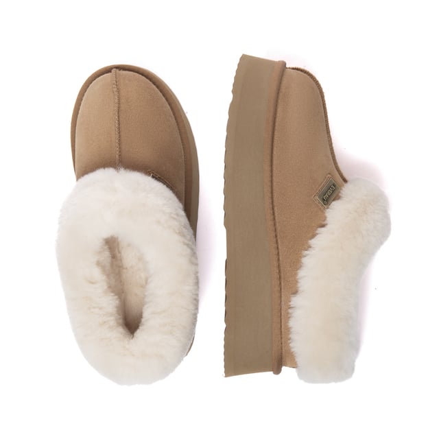 Stay snug and stylish in the timeless Topknot Ankle Slippers, the latest essential footwear with a trendy platform design. Crafted in five chic colour options, these slippers envelop your feet in luxurious sheepskin wool, offering irresistible comfort. Complete with a fluffy wool ankle collar, their enduring charm ensures they remain in vogue across seasons.

Product No. EAU2017

Description:
- Cow Suede Upper
Sheepskin Wool Insole and Lining
- EVA Sole