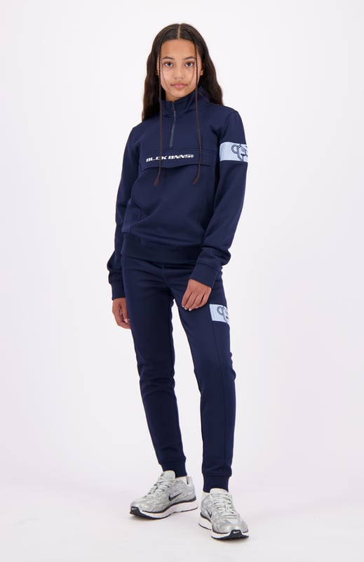 100 % Polyester Normale Passform Hoher Kragen mit halbem Reißverschluss Black Bananas Signatur-Klappe auf der Vorderseite Commander-Band am linken Arm Kombinierbar mit JR. COMMANDER TRACKPANTS 