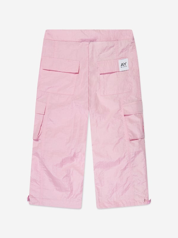 Dream big and feel fab with these girls pink woven cargo pants from AY by Ayla. The stylish and dramatic piece offers a light weight designed to look good with every move. Dance, jump and twirl with effect thanks to an on-trend aesthetic straight out of a music video. Pair with the label's sleeveless knit top for a cool and chic look. Elasticated Toggle Waistband 2 Side Pockets 2 Cargo Pockets 2 Back Pockets