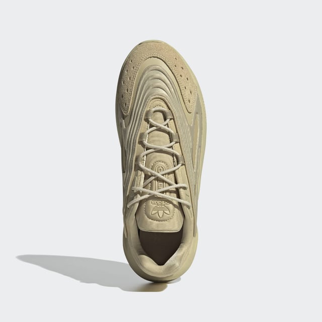 adidas may be a long way from the '90s, but these Ozelia Shoes are rooted in that loud, experimental era. Inspired by the adidas archives, the bold trainers have a chunky build that's all about being noticed. They're sleek with a fast look, and when your days are fast-paced, the Adiprene cushioning helps out on the comfort side of things.This product is made with recycled content as part of adidas' ambition to end plastic waste. 20% of pieces used to make the upper are made with minimum 50% recycled content.  - Snug fit - Lace closure - Textile upper - Hugs the foot - Adiprene cushioning - Rubber outsole - 25% of the components used to make the upper are made with a minimum of 50% recycled content  Shipped by adidas