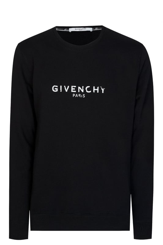 Brought to you by the iconic French label Givenchy. The expertly crafted sweatshirt is adorned with the classic Givenchy Paris logo, embossed in White for its contrasting and recognizable finish. The oversized design also features ribbed detailing on the cuffs, hemline and crew neckline for its complete look.