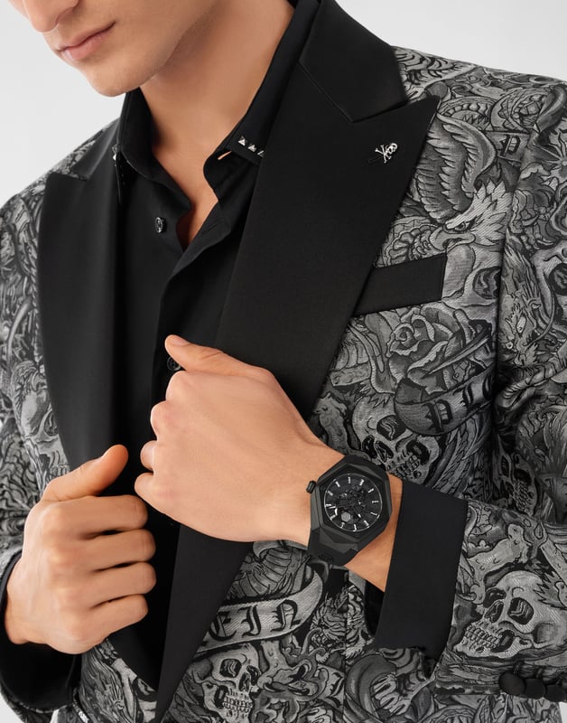 This Philipp Plein The $kull Spikes Analogue Watch for Men is the perfect timepiece to wear or to gift. It's Black 45 mm Round case combined with the comfortable Black Silicone watch band will ensure you enjoy this stunning timepiece without any compromise. Operated by a high quality Quartz movement and water resistant to 5 bars, your watch will keep ticking. A new legendary watch is born and it’s ready to shock the world. The Philipp Plein $kull Spikes is the icing on the cake of your collector status in the exclusive Philipp Plein universe. This Analogue watch has a function: Luminous Hands High quality 21 cm length and 24 mm width Black Silicone strap with a Buckle Case diameter: 45 mm,case thickness: 12 mm, case colour: Black and dial colour: Black