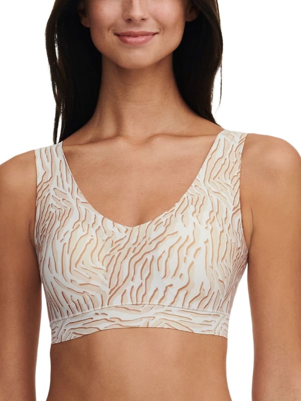 Chantelle SoftStretch Padded Bralette Top. With wide straps, V-shaped neckline and non-removable pads. Seamless construction and fully lined. Product is made of Nylon, Elastane, Polyester and is recommended hand-wash only.