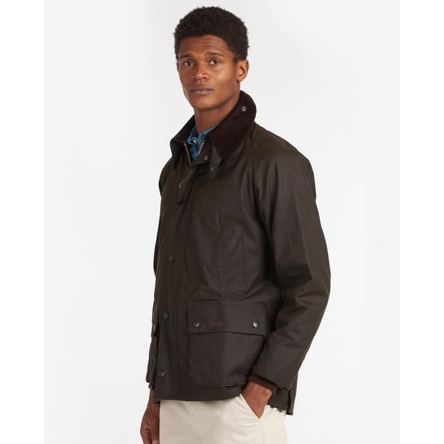 At the very heart of the Classic collection and a firm favourite year after year, the Classic Bedale is made using Barbour's 6oz Sylkoil.
Originally introduced for riding, this relaxed-fit jacket is now a seasonal staple in town and country alike, with a mediumweight waxed cotton outer that's comfortable to wear and offers robust weather protection. The two-way front zip is reinforced by hardy stud fastenings to seal out wind and rain, while moleskin-lined handwarmer pockets and generous bellow pockets are winter must-haves. A sit-down collar in signature corduroy creates a smart appearance, but can also be raised for additional protection in bad weather, with a luxurious feel against the face and throat.
Retaining unmistakeable Barbour authenticity, the Classic Bedale features a 100% cotton lining in the Original Classic Tartan print, adding an eye-catching heritage detail. This traditional men's waxed jacket is compatible with Barbour's zip-in liners and optional hoods, for all-round versatility.

100% waxed cotton outer
Pure cotton lining
100% cotton sleeve lining
Inner ribbed sleeves
Two way zip
Corduroy collar
Two handwarmer pockets
Two large bellow pockets
Back length: 76 - 81cm's | 30" - 32"
Studded for optional hood
Interactive zip