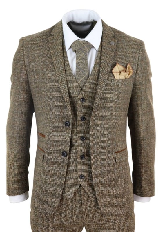 Max out on Tweed and Check with this three piece suit, A timeless design with both vintage appeal and practicality. Created using a Tweed weave of rich wool mix material and brown piped velvet pocket trimmings, this suit will keep you well insulated and will successfully stand the test of time. Ideal for country barn weddings, proms, parties and much more