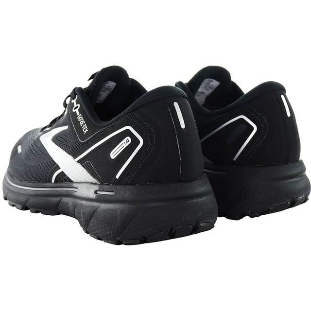 Experience the perfect blend of cushioning, support, and weather protection with the Brooks Ghost 14 GTX Men's Black Running Trainers. Engineered for the dedicated runner, these trainers combine Brooks' innovative technology with a sleek design for an unparalleled running experience.

Key Features:

 GORE-TEXÂ® Technology:  The inclusion of GORE-TEXÂ® technology ensures these trainers are waterproof and breathable, providing protection against various weather conditions.

 Advanced Cushioning:   The Ghost 14 features Brooks' signature cushioning technology, offering a responsive and plush feel with every stride.

 Supportive Structure:   Engineered with a supportive structure, these trainers provide stability and comfort, making them ideal for both short sprints and long-distance runs.

 Versatile Black Design:   The sleek black color adds a touch of sophistication while remaining versatile for various running outfits and styles.

 Durable Outsole:   The trainers are equipped with a durable outsole, offering excellent traction on various surfaces and ensuring longevity.

 Brooks Branding:   Look for the iconic Brooks logo, a symbol of the brand's commitment to quality and performance in the running community.

 Comfortable Fit:   Designed with the runner's comfort in mind, these trainers feature a secure and comfortable fit to enhance your running experience.

Running Performance:

 Responsive Ride:   The Ghost 14 provides a responsive ride, ensuring a smooth transition from heel to toe during your runs.

 Adaptable to Terrain:   Whether you're hitting the pavement or tackling trails, these trainers adapt to different terrains, offering a reliable grip and support.

 All-Weather Performance:   With GORE-TEXÂ® technology, these trainers are ready for all-weather performance, keeping your feet dry and comfortable in rain or shine.