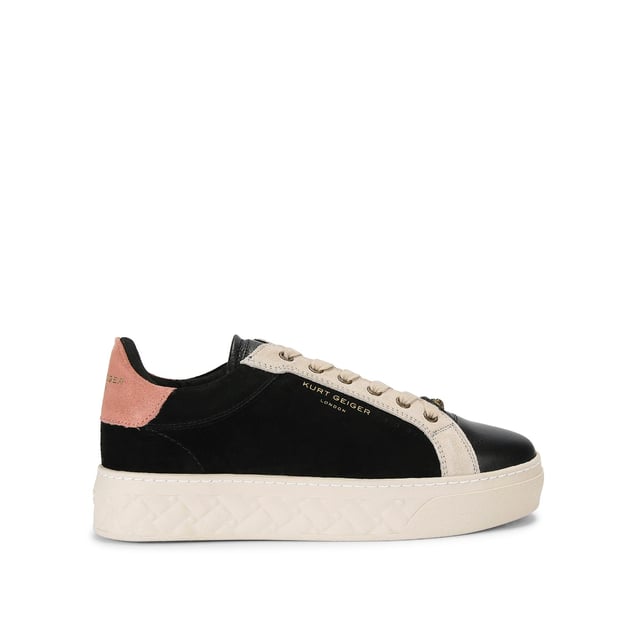 The Kensington Cupsole sneaker features a black suede leather upper with grey and pink panels. The front laces up with antiqued eagle head at the base of the laces. The sole is quilted in rubber.