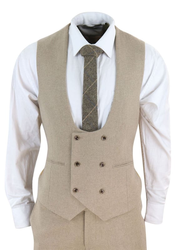Elegant and Timeless Design: The men's tweed 3-piece suit in a tan oak color exudes a classic and sophisticated look, perfect for weddings and other formal occasions. The double-breasted waistcoat adds an extra touch of refinement. Tailored Fit for a Flattering Silhouette: This suit is designed with a tailored fit, ensuring it accentuates your body shape and provides a sharp and polished appearance. The precision tailoring guarantees a comfortable and stylish fit throughout the day. High-Quality Tweed Fabric: Crafted from premium tweed fabric, this suit offers exceptional durability and a luxurious feel. The tweed material is renowned for its breathability and resilience, making it ideal for both indoor and outdoor events. Versatile Styling Options: The tan oak color of this suit allows for versatile styling options. It can be paired with a variety of shirt and tie combinations to achieve different looks, whether you prefer a traditional or more contemporary style. Material : 65% Polyester, 35% Viscose