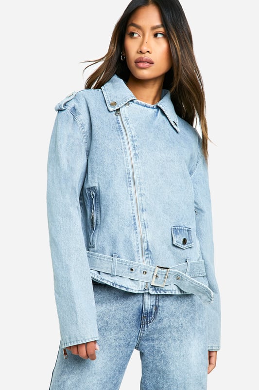Classic biker-style denim jacket with a modern twist
        Adjustable belt detail for a customisable fit
        Asymmetrical zip closure for edgy appeal
        Notched collar and epaulettes for authentic biker look
        Functional side pockets and chest pocket for practicality
    
    Embrace your inner rebel with this contemporary take on the timeless denim jacket. The biker-inspired design combines urban edge with versatile style, making it a must-have addition to your wardrobe. Perfect for casual outings, this jacket can effortlessly transition from day to night. Pair it with high-waisted jeans and a graphic tee for a laid-back lunch date, or throw it over a floral dress to add a touch of attitude to your ensemble. The adjustable belt allows you to cinch in the waist for a more tailored silhouette or leave it loose for a relaxed vibe. Ideal for family gatherings or casual meet-ups with friends, this jacket is sure to become your go-to outerwear piece. Its durable denim construction ensures longevity, while the classic design promises to remain stylish season after season.