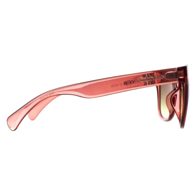Calvin Klein Square Womens Transparent Brown Brown Gradient CK22553S  Sunglasses feature a chic square frame, crafted from high-quality acetate for a luxurious and comfortable feel. The design is accentuated by subtle detailing that adds a touch of glamour without overwhelming the minimalist aesthetic. The lenses provide complete UV protection, ensuring your eyes are shielded from harmful rays while offering excellent visual clarity.