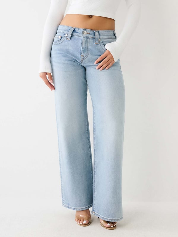 Relax your denim style with the Bobbi Baggy Jean. This relaxed fit women's baggy jean features fading, 3D whiskering, clean hardware, and classic gold stitching. Finished with 1/2" horseshoe detailing along the back pockets.    