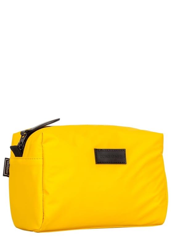 Constructed from our high quality splash proof tarpaulin to protect your essentials, the Mansville wash bag is a must have. It’s all in the detail with a specialist waterproof zip providing easy access to the main compartment. The interior features our wipe clean Consigned logo lining with double slip pockets and a large central compartment for all your essential cosmetic needs. Features: , Tarpaulin exterior, CONSIGNED rubberised patch logo, Waterproof zip feature, Zip top opening, CONSIGNED branded black interior Style Ref: 50329 YELLOW