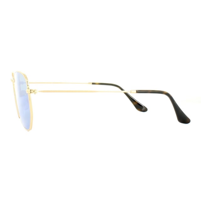 Ray-Ban Sunglasses Hexagonal 3548N 001/9O Gold Light Blue Gradient Mirror 54mm are a very unique hexagonal shaped frame and feature the latest flat crystal lenses for a updated version of the classic metal round sunglasses. Super thin temples and coined profile to the frame finish the modern fashionable look.