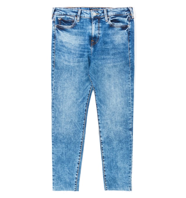 True Religion offers any variety of denim that you could seek. The Collette style jeans offer a more spacious alternative to the skinny jean whilst still hugging your figure. The devil is in the details with True Religion jeans  from the horseshoe pocket stitching to the raw cut hems. These jeans are quintessential for a cool  calm and collected look. -Mid Blue Wash-Raw Cut Hems-Horseshoe Stitching on Back Pockets-Slim Line Fit-Mid Rise-Contrast Stitching-Metal Horse Shoe Detail on Watch Pocket-True Religion Branded Jacron