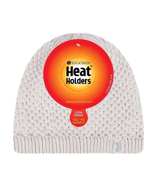 Finding a hat that combines innovative insulation technology with style is always difficult when shopping for items to keep you warm and cosy for the winter weather. These Heat Holders Nora styled heatweaver hats eradicate that problem, meaning you can look fabulously fashionable whilst keeping super warm. These ladies hats have a fleece plush insulating lining, called Heatweaver, that is even more effective at holding warm air than any regular lining. This lining is designed to be soft with a luxurious feel whilst holding warm air close to your skin, effectively keeping the cold air out. All of this is designed to ensure that you are toasty warm throughout the cold weather. The knit is different from previous Heat Holders, with a loosely knit look as opposed to the traditional cable knit look. These ladies Heat Holders Nora styled hats are available in 5 colours. They come in one size and they are machine washable. Light Grey and Rose: 54% Polyester, 46% Acrylic outer / 100% Polyester lining. Black. Purple, Cream: 100% Acrylic outer / 100% Polyester lining.