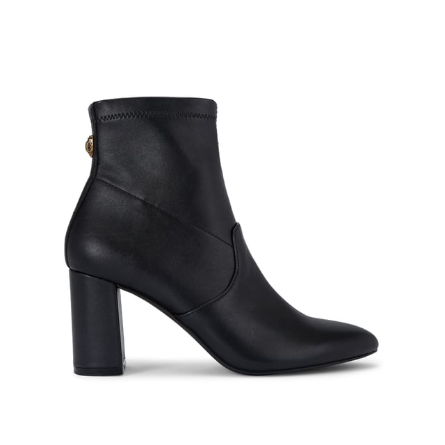 The Kurt Geiger Langley Ankle Boot features a black leather upper. The ankle features a zip closure and antiqued brass eagle head on the back. Heel height: 8cm.