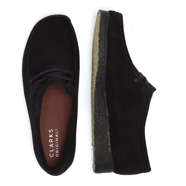 Launched in 1964, the moccasin-inspired Wallabee, with its clean and simple lines, has become an iconic Clarks design. Crafted from premium suede this classic design features a distinctive crepe sole along with a 2-eye lace-up fastening .