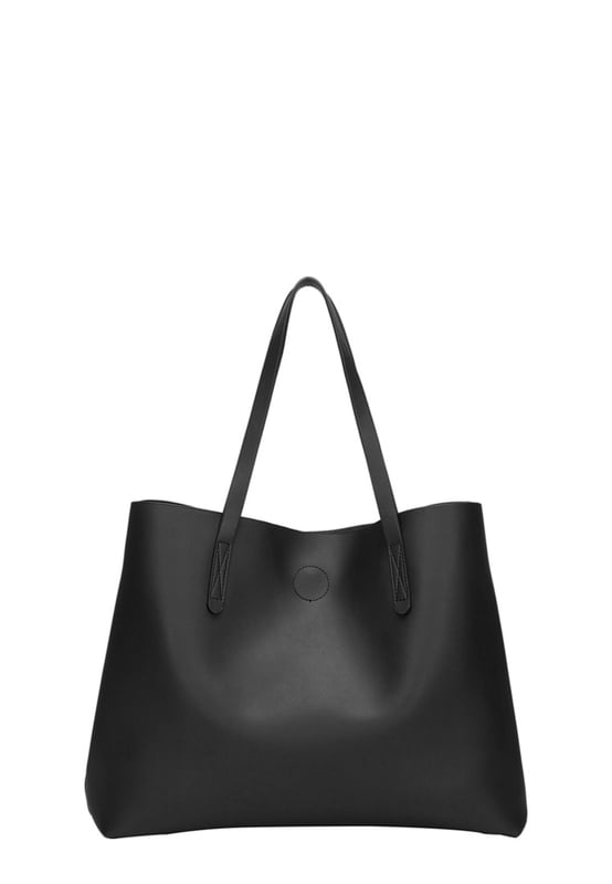 Let simplicity be key with the Ophelia tote bag, perfect for taking your look through the week. In a range of colours this tote is made from unlined PU making it lightweight and spacious. With simple design features such as the Claudia Canova debossed logo, this bag is perfect for everyday sleek style. The bag fastens with a mag-dot clasp and inside reveals an inner pouch with a zip fastening to keep all your daily essentials safe. Features: , Unlined PU, Claudia Canova debossed logo, Mag-dot clasp fastening, Twin grab handles, Soft and flexible shape, Removable inner pouch with zip fastening Style Ref: 84395